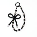 Onyx Bow Statement Charm