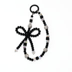 Onyx Bow Statement Charm
