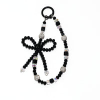 Onyx Bow Statement Charm