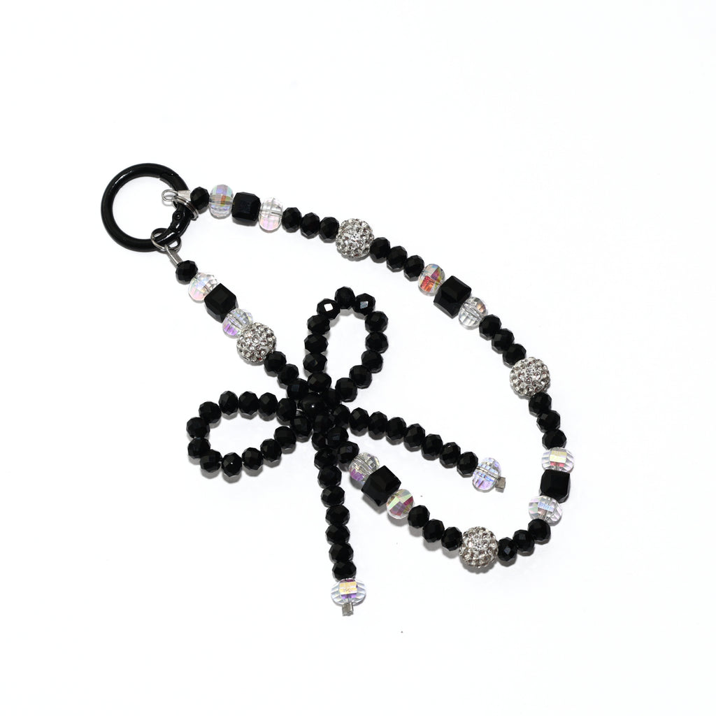 Onyx Bow Statement Charm