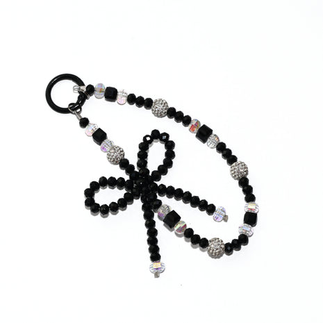 Onyx Bow Statement Charm