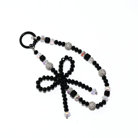 Onyx Bow Statement Charm