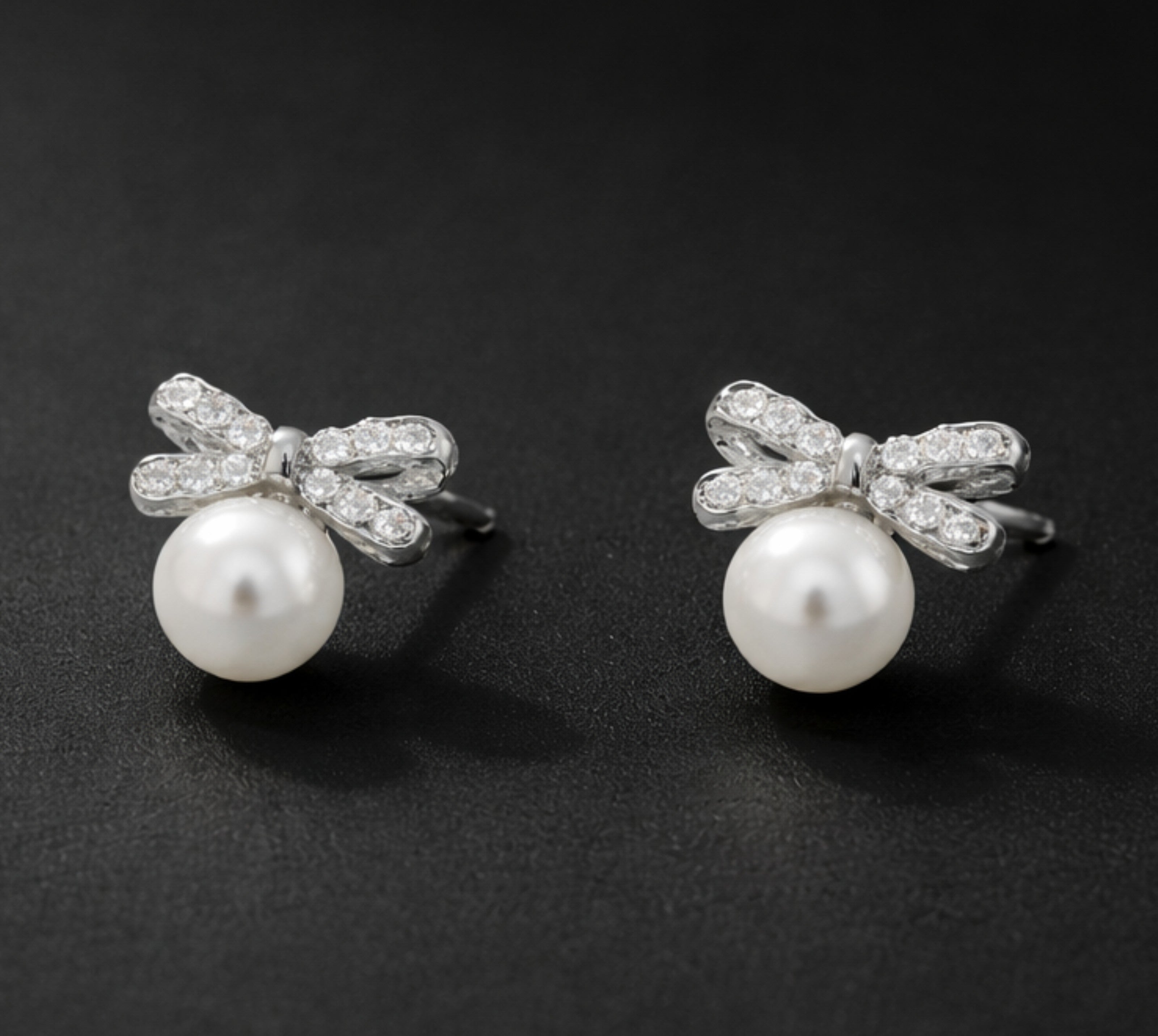 Pearl Bow Sparkle Stud