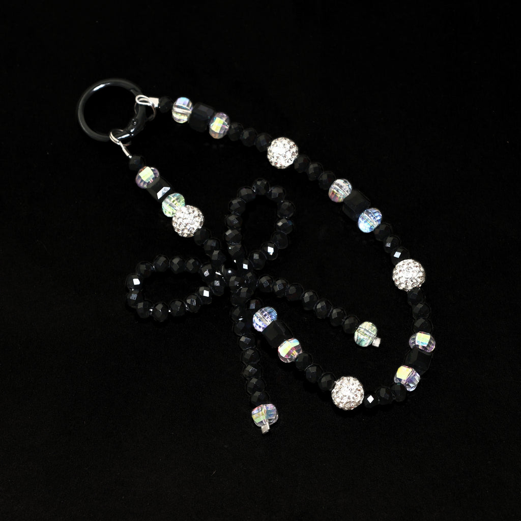 Onyx Bow Statement Charm