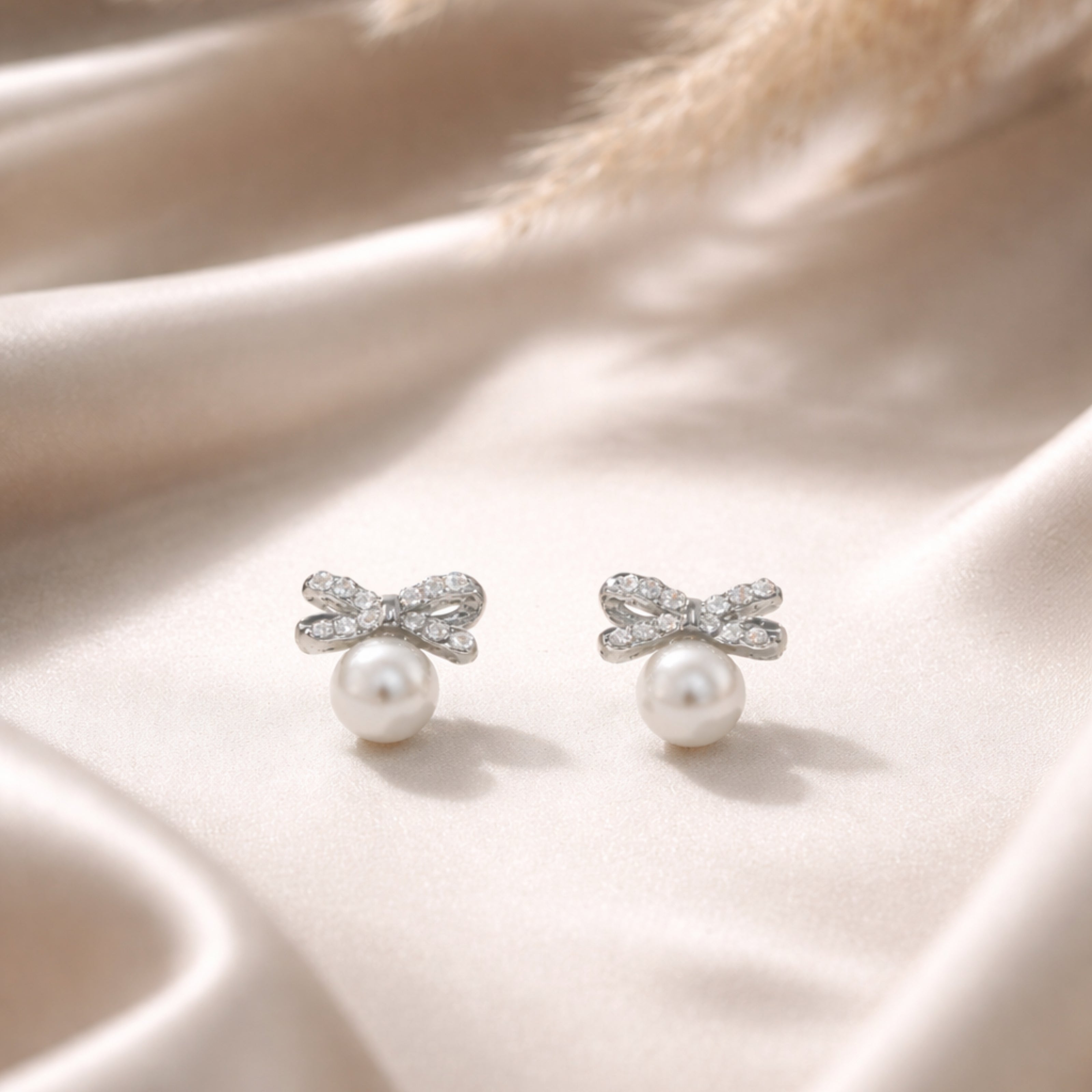 Pearl Bow Sparkle Stud