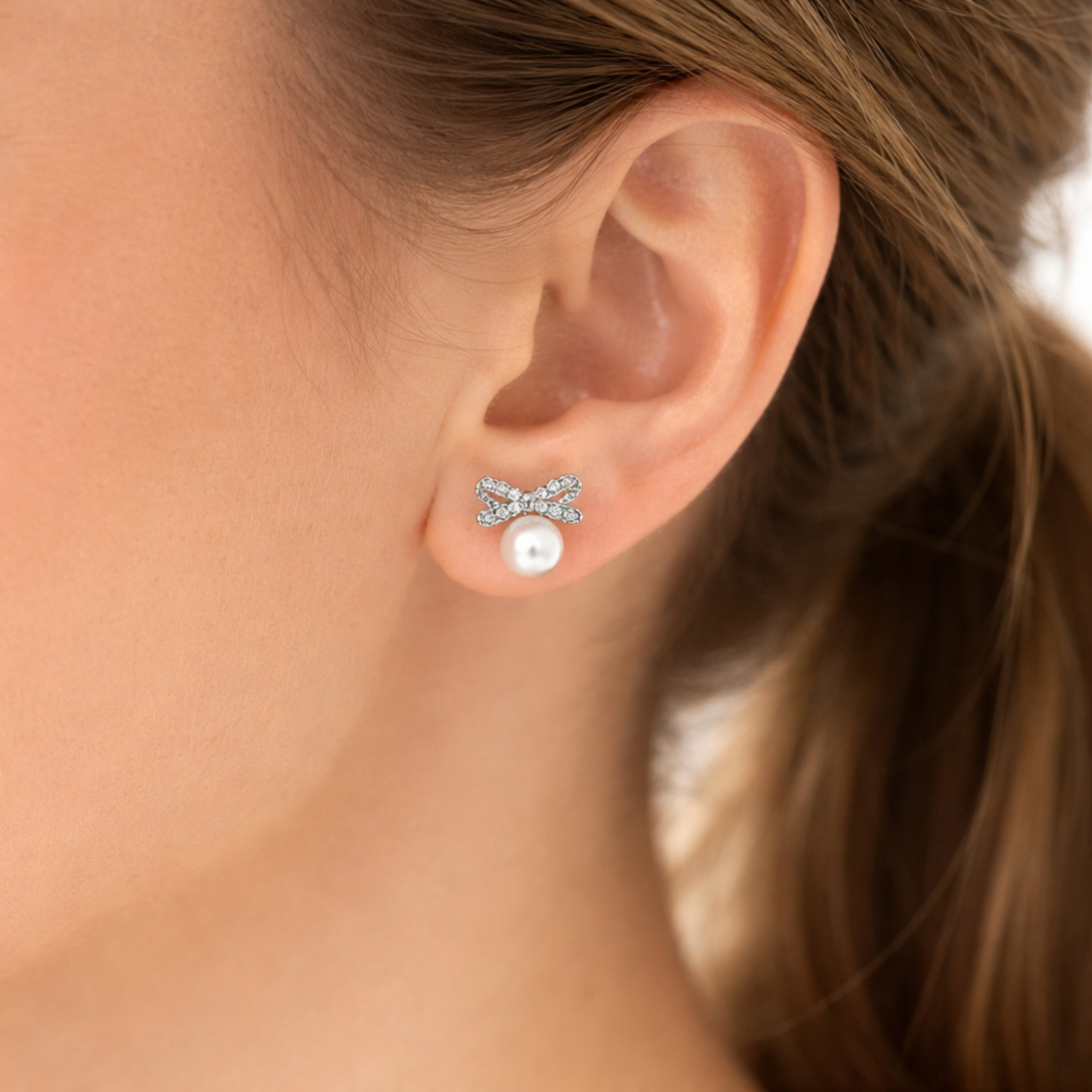 Pearl Bow Sparkle Stud
